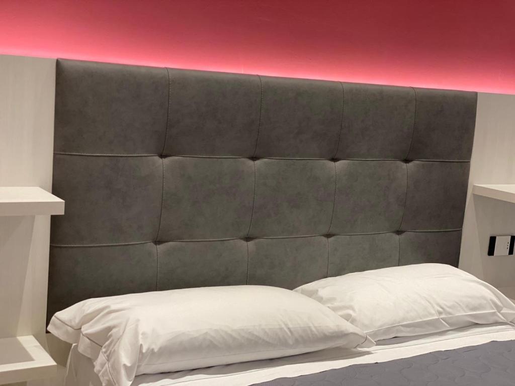 Postel nebo postele na pokoji v ubytování B&B Bertani