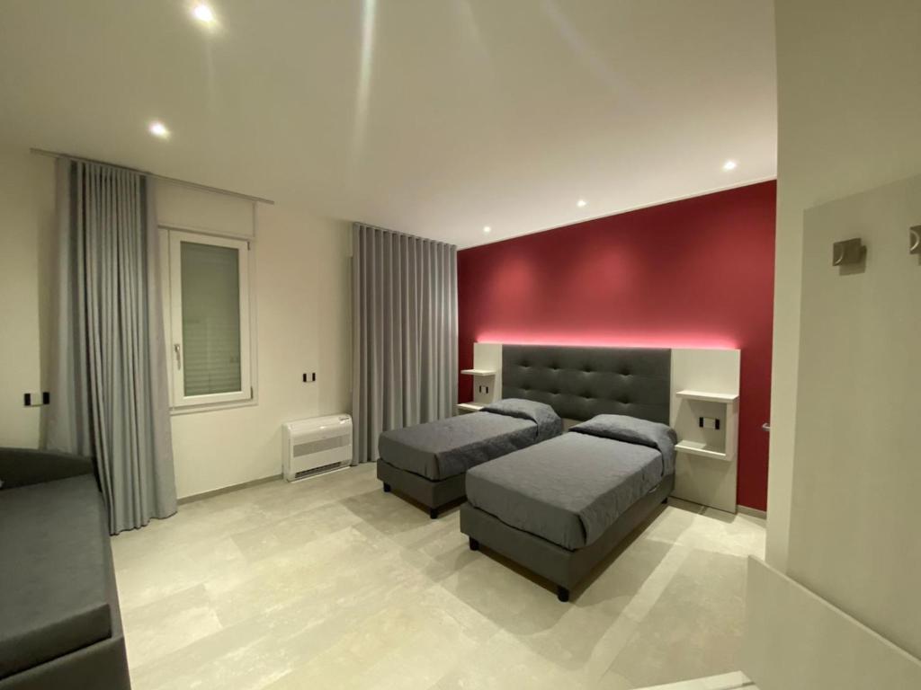 Postel nebo postele na pokoji v ubytování B&B Bertani