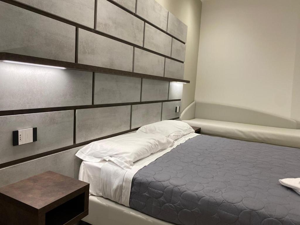 Postel nebo postele na pokoji v ubytování B&B Bertani