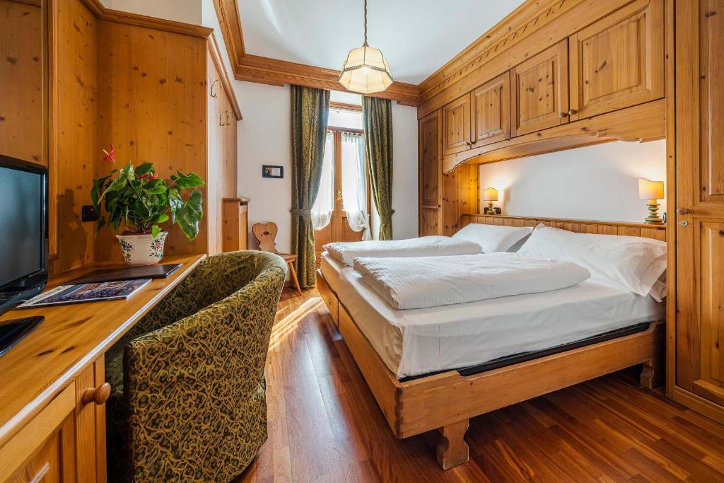 Postel nebo postele na pokoji v ubytování Franceschi Park Hotel