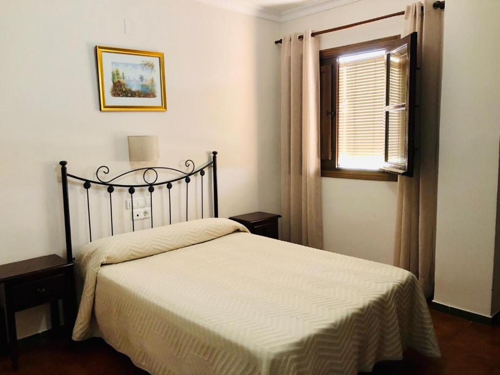Postel nebo postele na pokoji v ubytování Hotel La Yedra