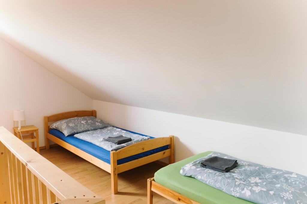 Postel nebo postele na pokoji v ubytování Ubytování Na Sklípku