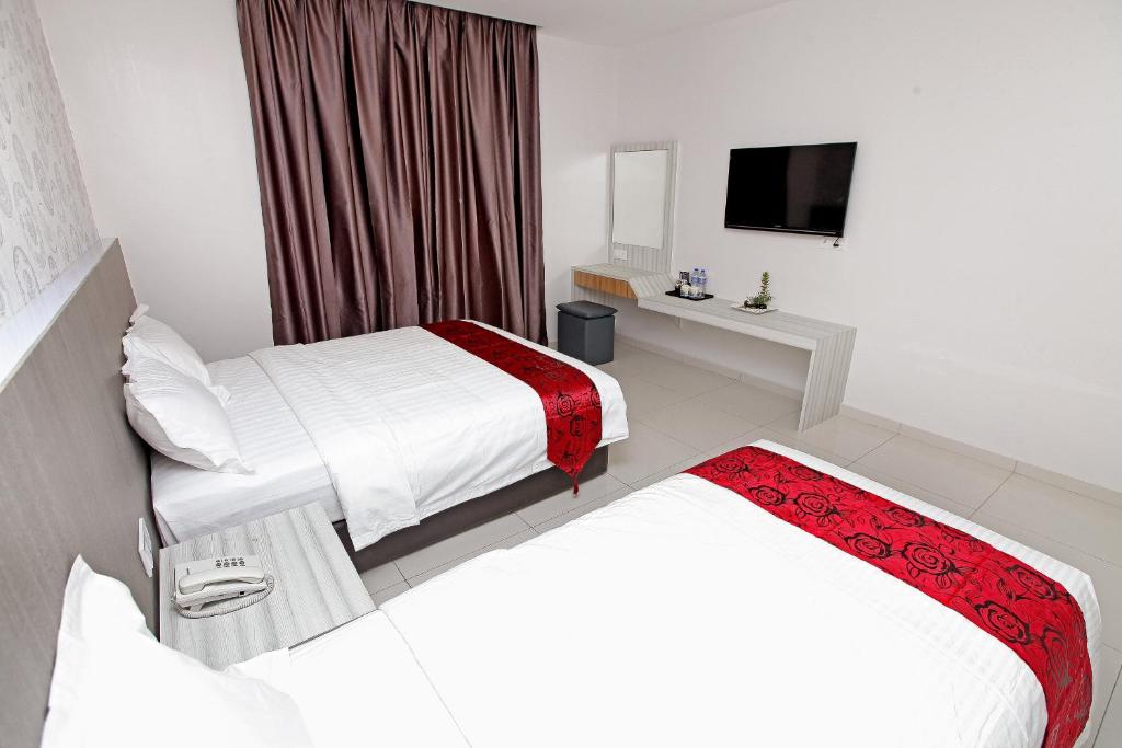 Postel nebo postele na pokoji v ubytování B&L HOTEl