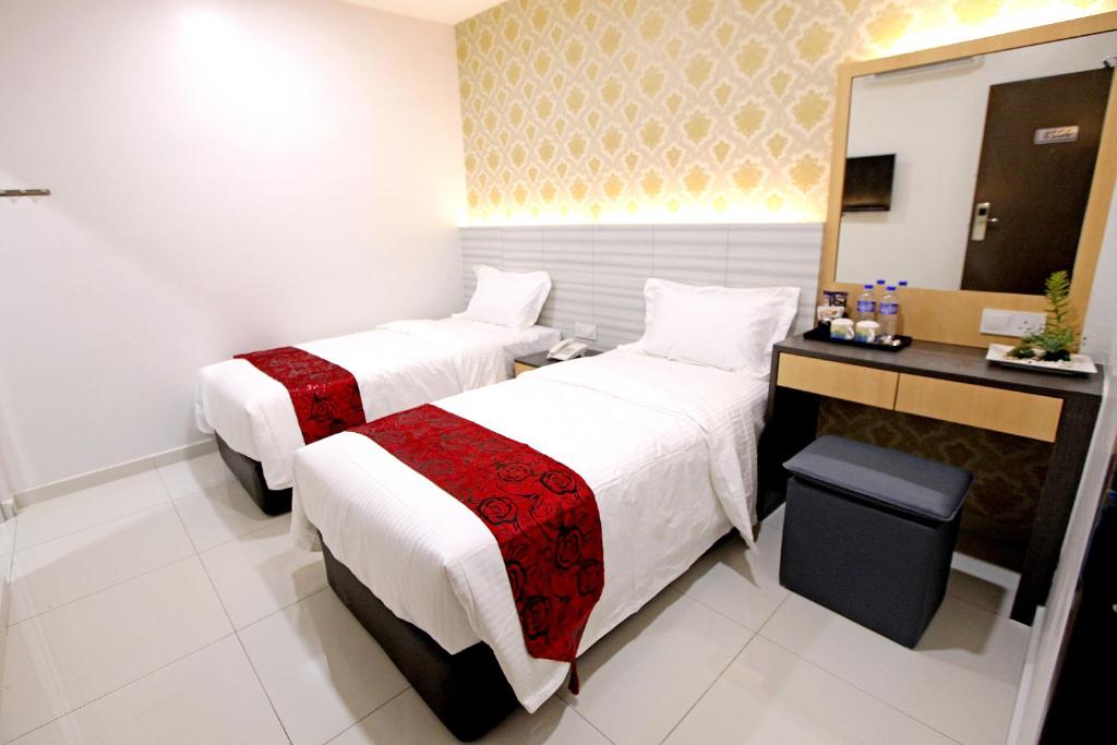 Postel nebo postele na pokoji v ubytování B&L HOTEl