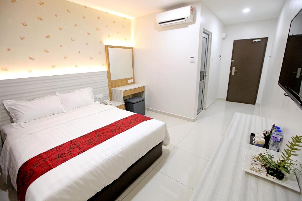 Postel nebo postele na pokoji v ubytování B&L HOTEl