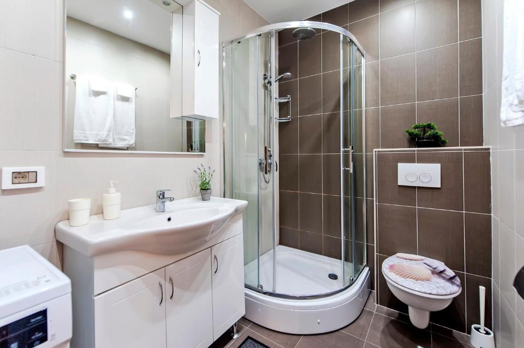 Kúpeľňa v ubytovaní Luxury Apartment KASTELA ANTIKA