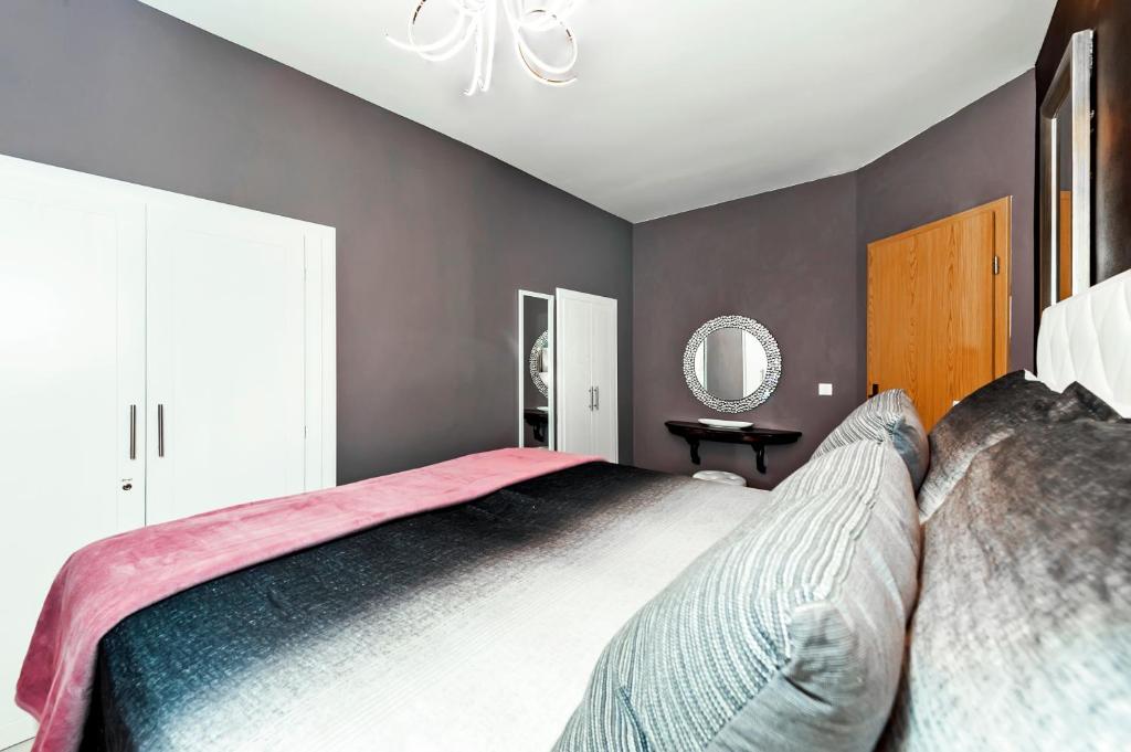 Posteľ alebo postele v izbe v ubytovaní Luxury Apartment KASTELA ANTIKA