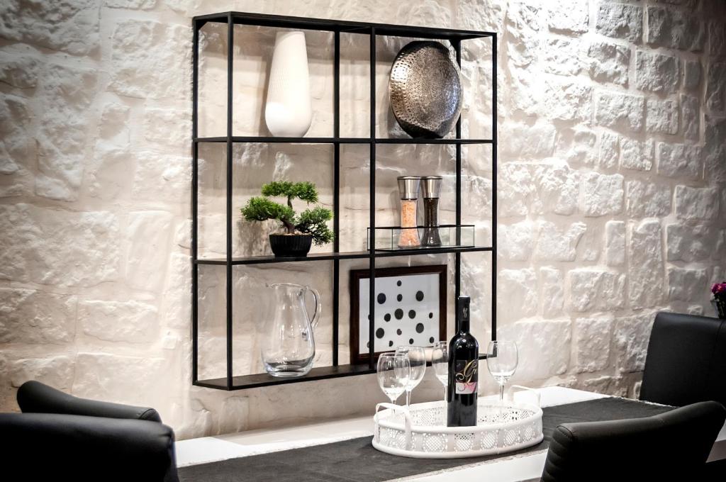 Posedenie v ubytovaní Luxury Apartment KASTELA ANTIKA