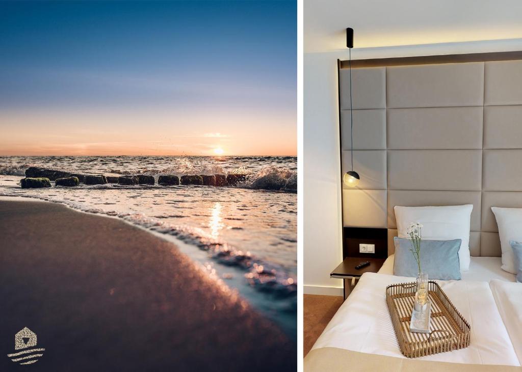 una habitación de hotel con cama y el océano en White Pearl Apartment 3.04, en Timmendorfer Strand