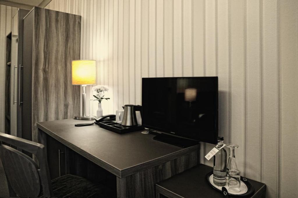 TV o dispositivi per l'intrattenimento presso Konsumhotel Dorotheenhof Weimar