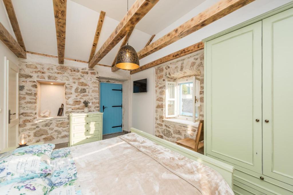 Postel nebo postele na pokoji v ubytování Holiday Home Lipa Naša