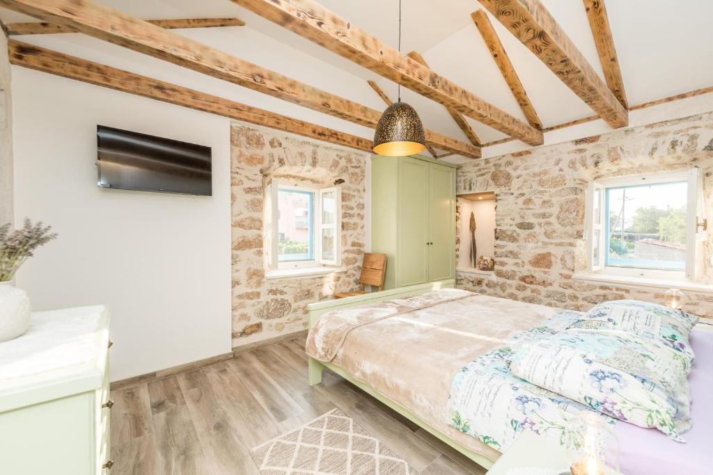 Postel nebo postele na pokoji v ubytování Holiday Home Lipa Naša