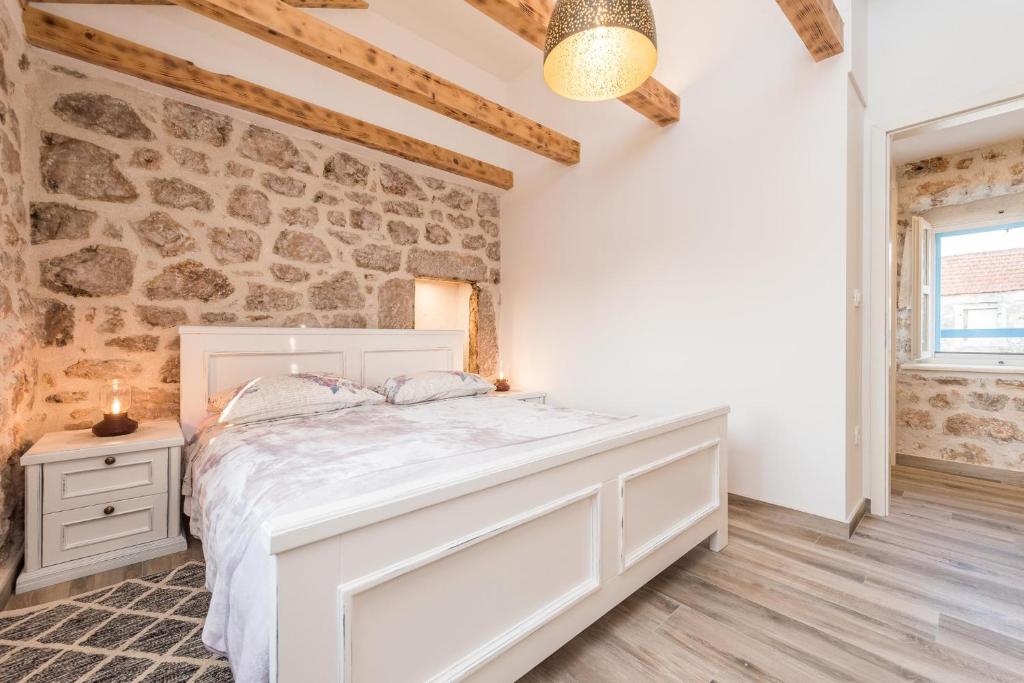 Postel nebo postele na pokoji v ubytování Holiday Home Lipa Naša