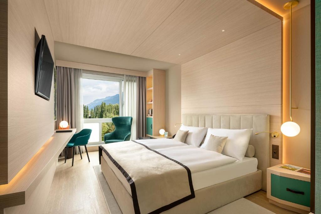 Postel nebo postele na pokoji v ubytování Hotel Vatel 4* Superior