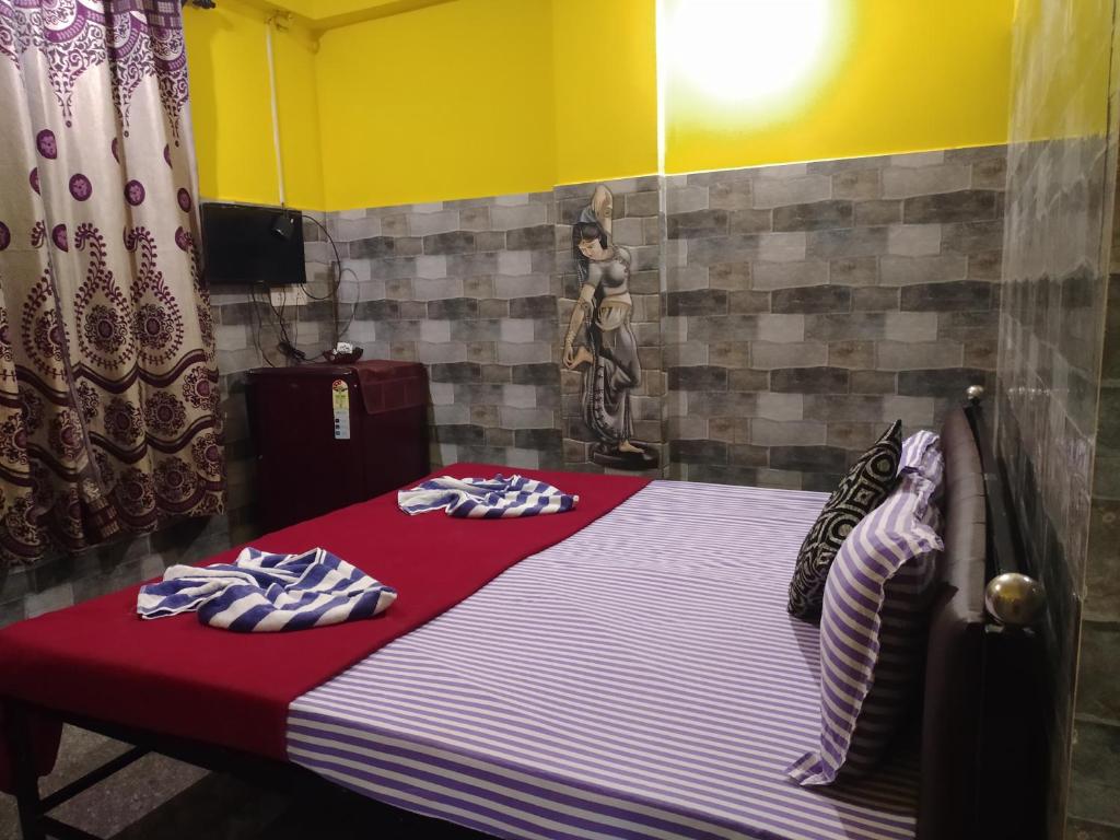 Postel nebo postele na pokoji v ubytování Baga F Leisure Stay Guest House
