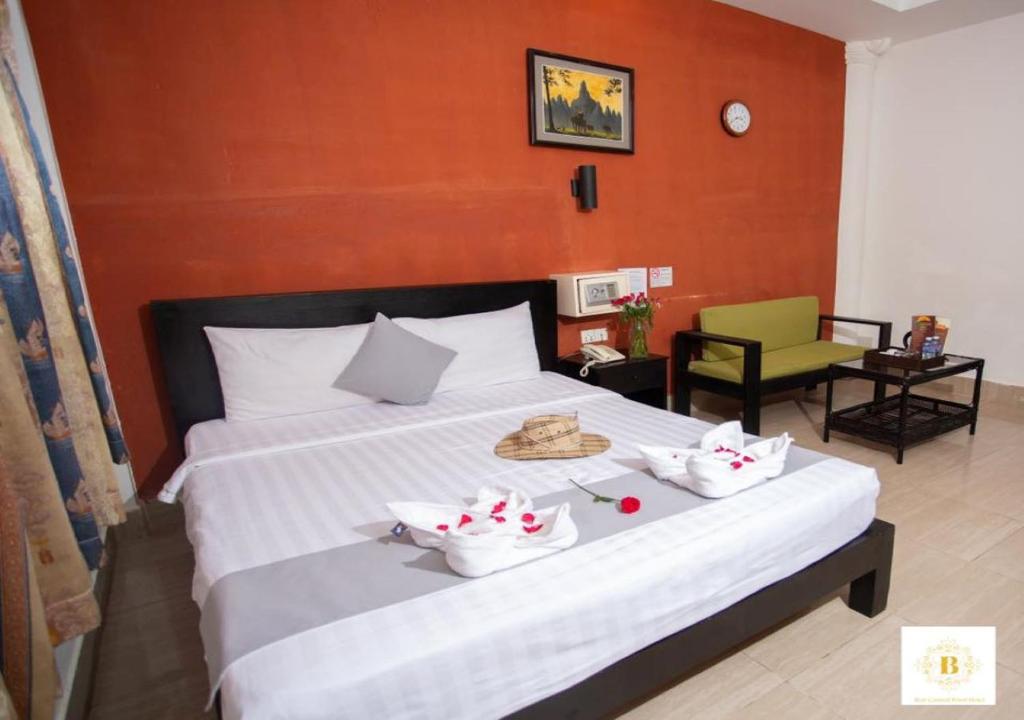 Postel nebo postele na pokoji v ubytování Best Central Point Hotel