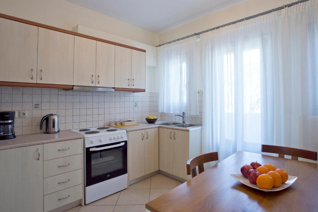 Kuchyň nebo kuchyňský kout v ubytování Santorini Med Homes - Sunday Apartment