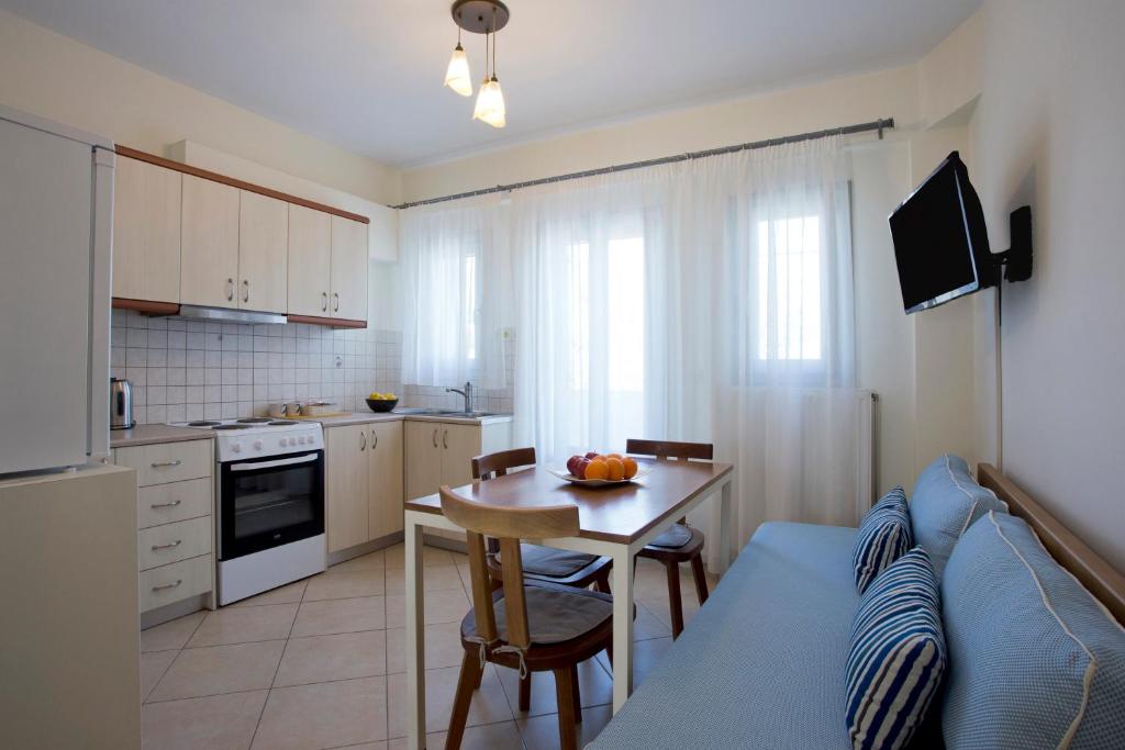 Kuchyň nebo kuchyňský kout v ubytování Santorini Med Homes - Sunday Apartment