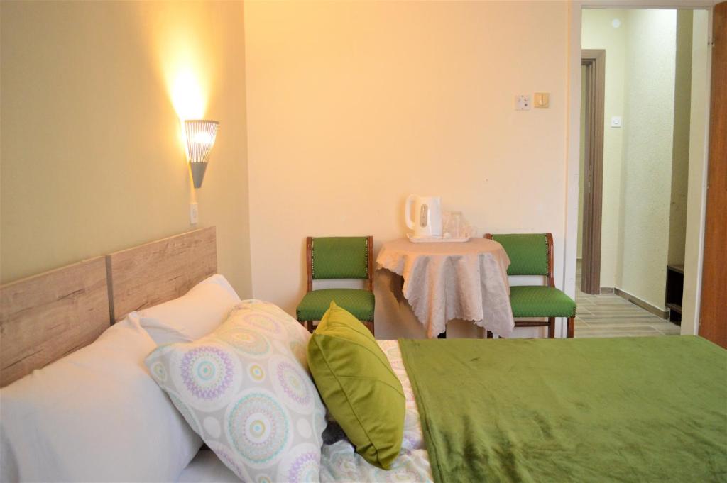 Postel nebo postele na pokoji v ubytování Hotel Park