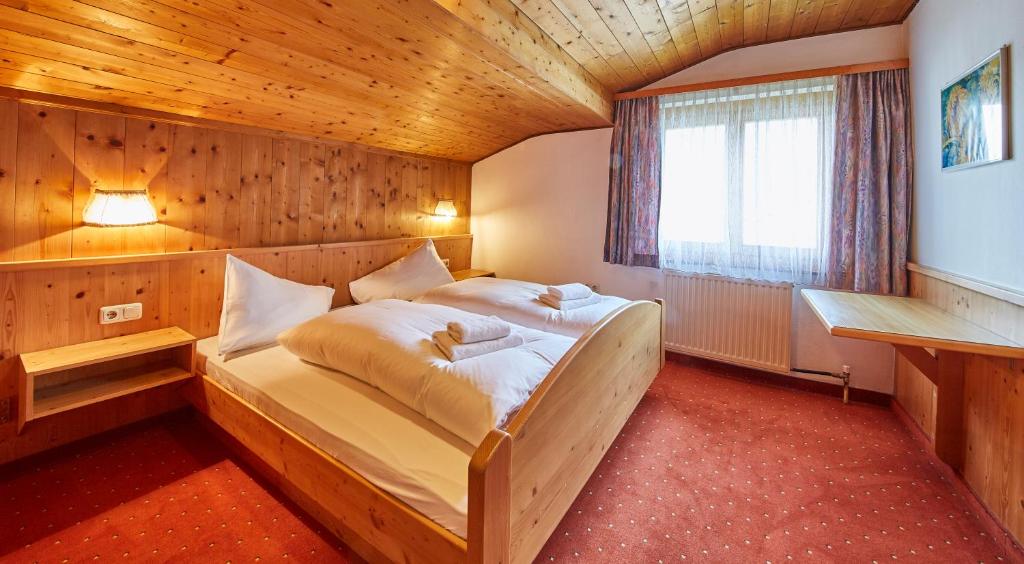 Postel nebo postele na pokoji v ubytování Appartements Christine