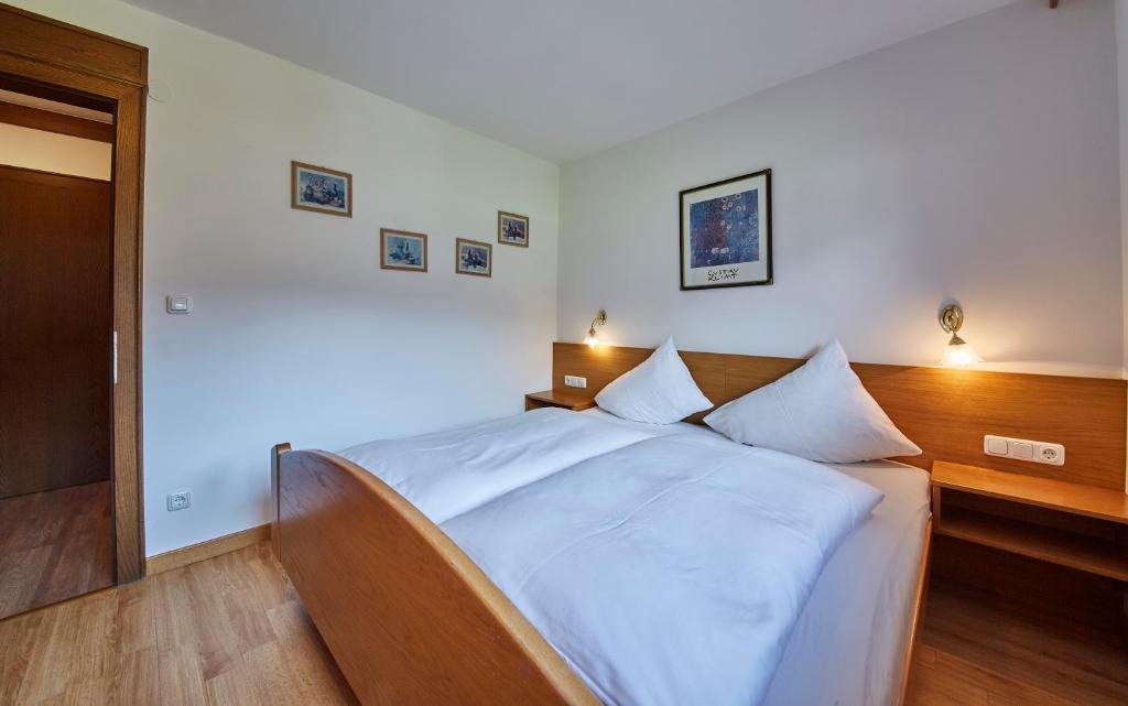 Postel nebo postele na pokoji v ubytování Appartements Christine