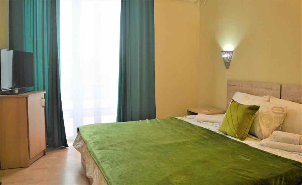 Postel nebo postele na pokoji v ubytování Hotel Park