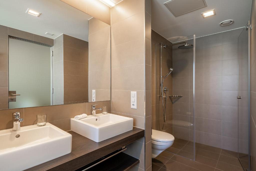 Koupelna v ubytování Hotel Artos Interlaken