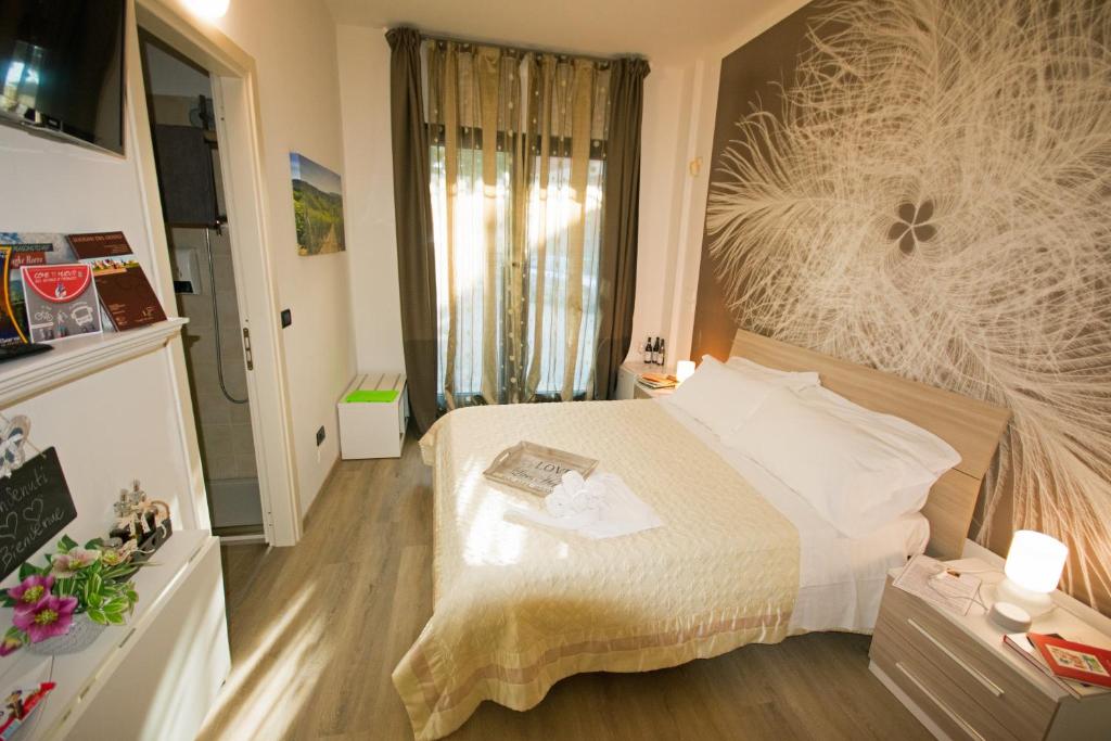 Posteľ alebo postele v izbe v ubytovaní Alba Serena Camere