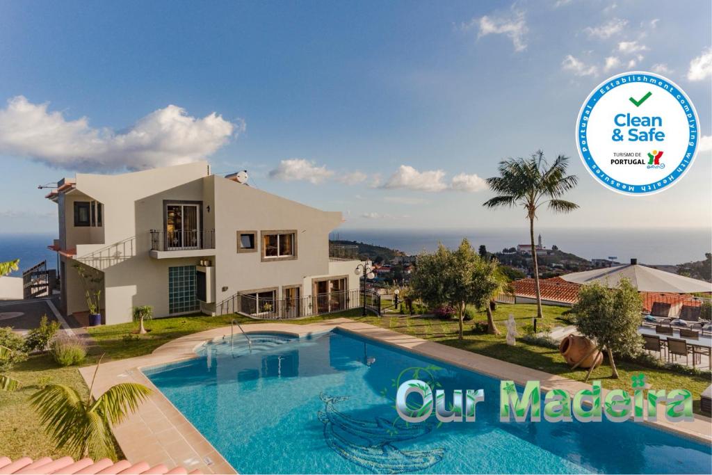 Cette villa avec vue dispose d'une piscine. dans l'établissement OurMadeira - BelAir, fabulous, à Funchal