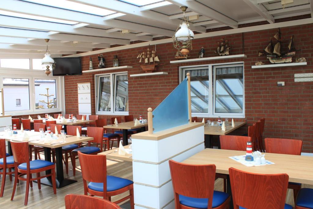 Restaurace v ubytování Hotel & Restaurant Am Wasser