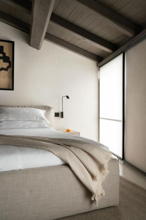 Postel nebo postele na pokoji v ubytování Hotel Scenario