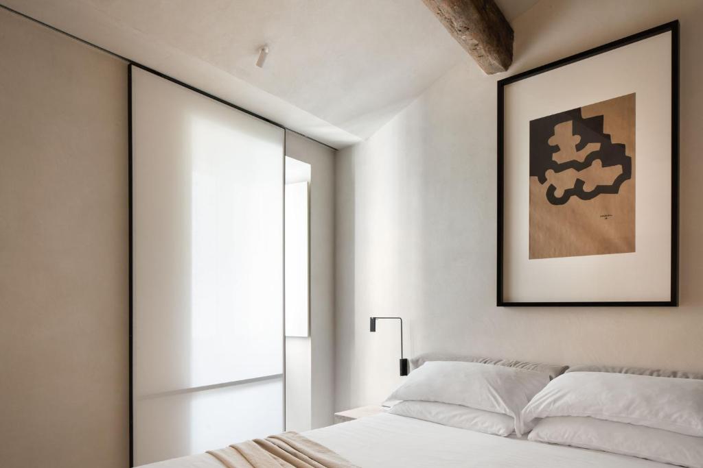 Postel nebo postele na pokoji v ubytování Hotel Scenario
