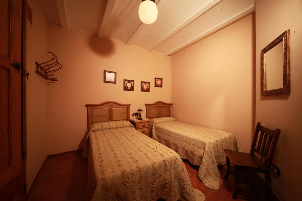Postel nebo postele na pokoji v ubytování Casa Rural Rosa