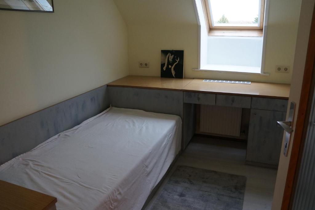 Łóżko lub łóżka w pokoju w obiekcie Ferienwohnung Donauauen