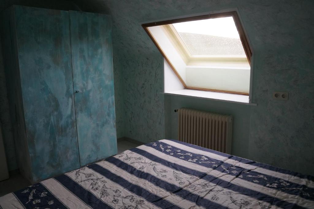 Łóżko lub łóżka w pokoju w obiekcie Ferienwohnung Donauauen