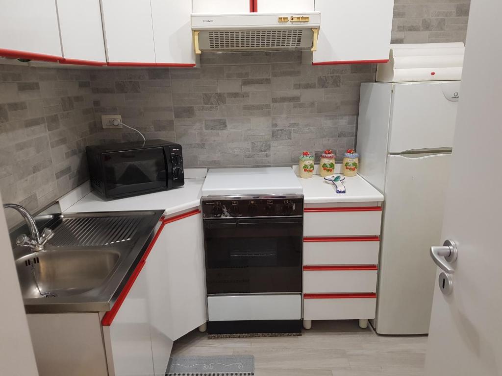 Kuchyň nebo kuchyňský kout v ubytování La Casa Di Francesco (Trilocale Arredato)