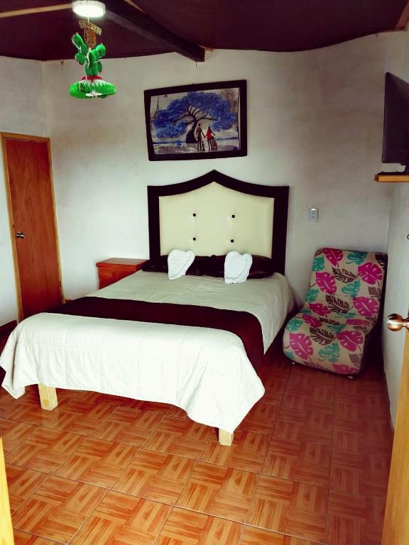 Letto o letti in una camera di Cabañas tipo habitación Planta Alta en Zacatlán