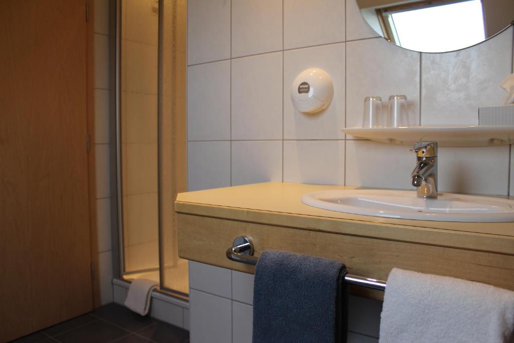 Koupelna v ubytování Hotel Reiff