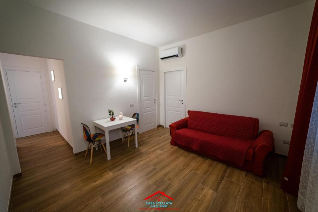 Area soggiorno di Casa stellata Napoli home in the center