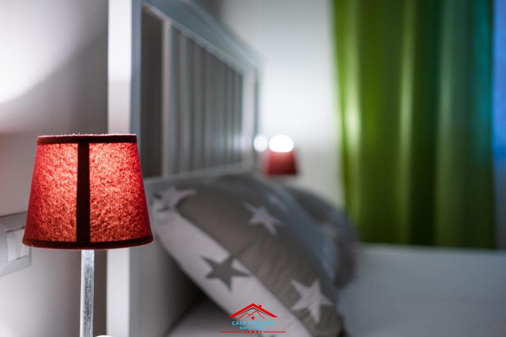 Letto o letti in una camera di Casa stellata Napoli home in the center