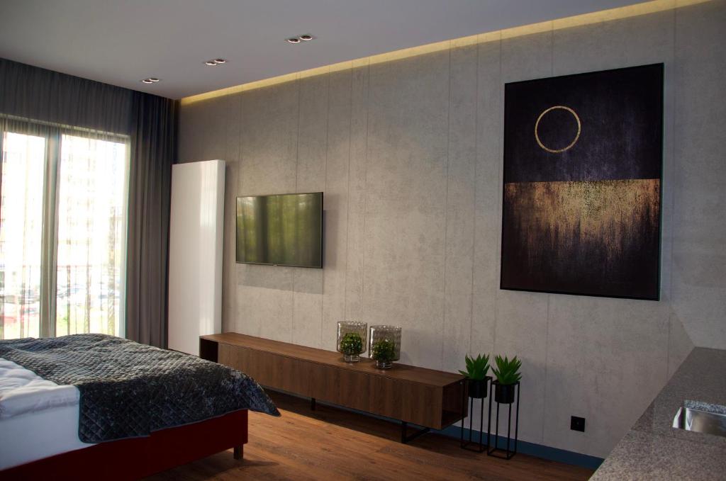 Postel nebo postele na pokoji v ubytování Aparts Hotel Radom