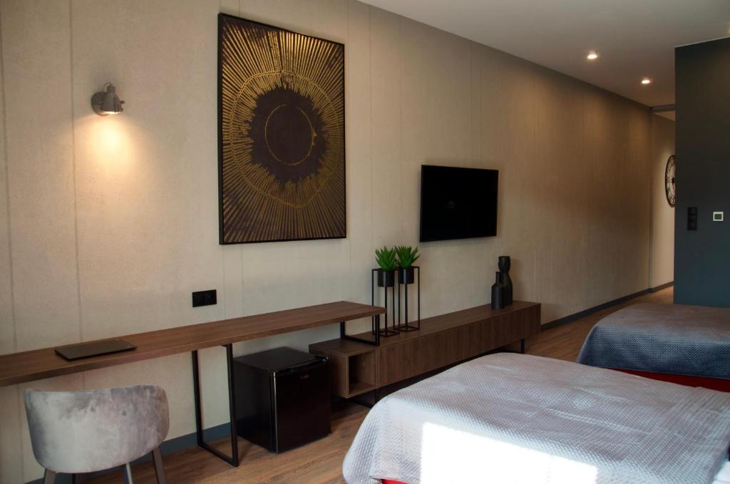 TV a/nebo společenská místnost v ubytování Aparts Hotel Radom