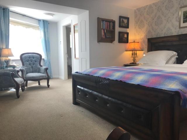Postel nebo postele na pokoji v ubytování Crystal Springs B&B