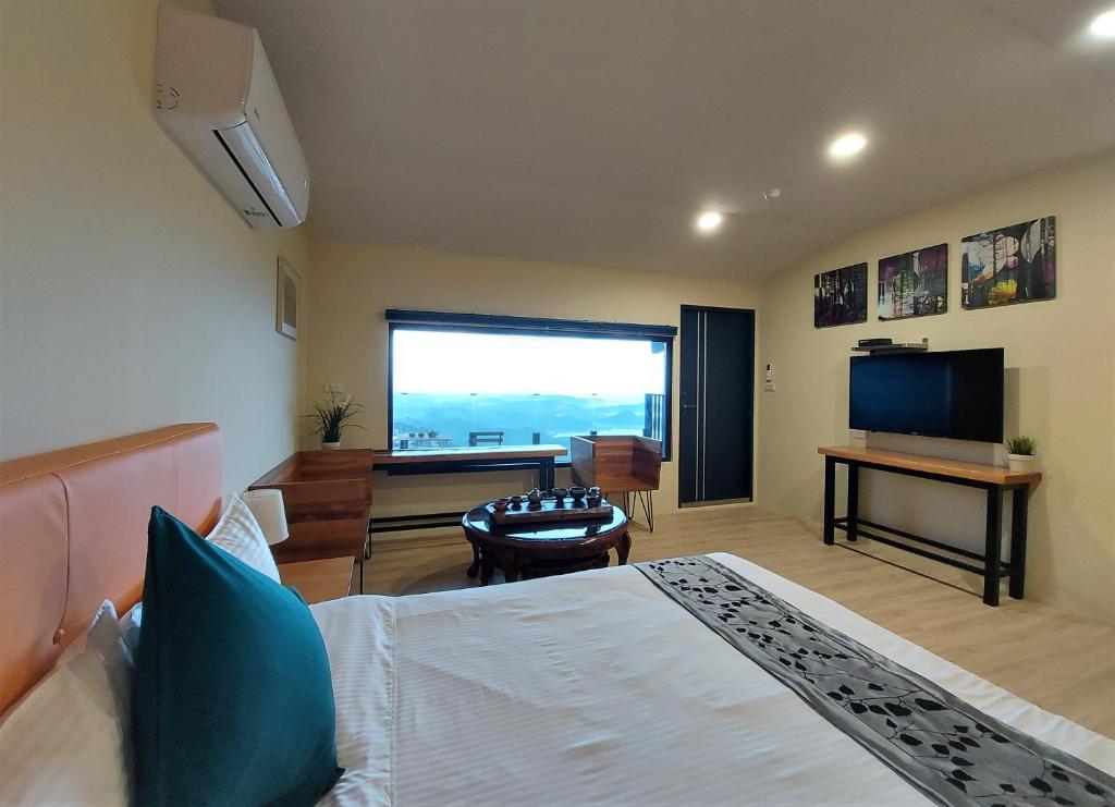 TV a/nebo společenská místnost v ubytování Dosun B&B