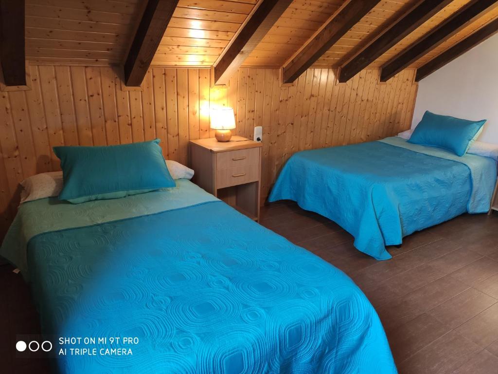 Postel nebo postele na pokoji v ubytování Apartamentos Goizeder