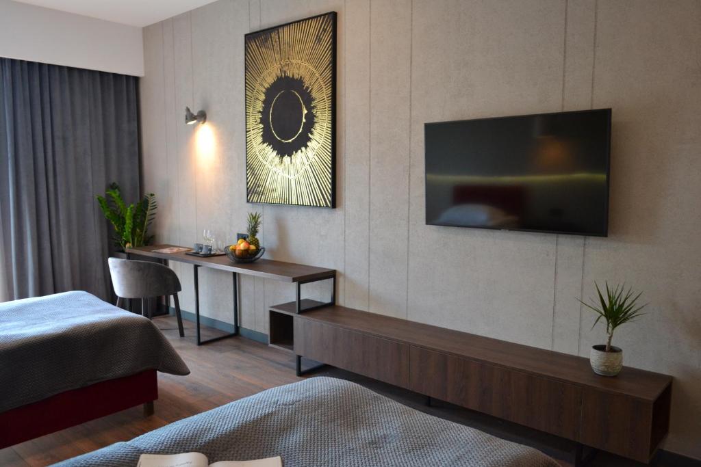 TV a/nebo společenská místnost v ubytování Aparts Hotel Radom
