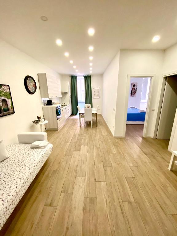 A bed or beds in a room at APARTMENT VITERBO CENTRO CORSO