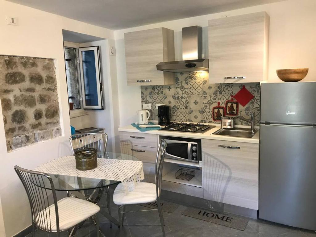 Kuchyň nebo kuchyňský kout v ubytování Hannette Cinqueterre Apt Libeccio