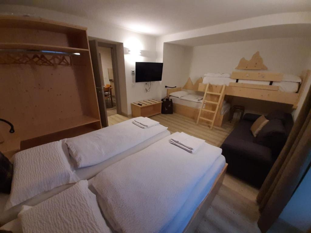 Posteľ alebo postele v izbe v ubytovaní B and B nonna Rosa vista Lagorai