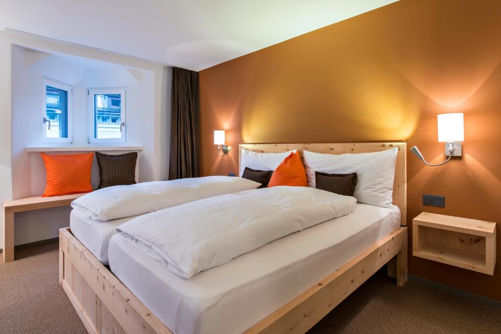 Postel nebo postele na pokoji v ubytování Hotel Donatz